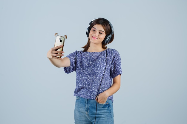 Expressive young woman posing in the studio