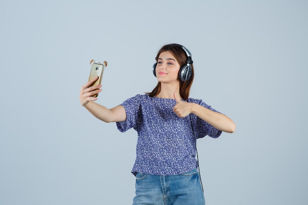 Expressive young woman posing in the studio