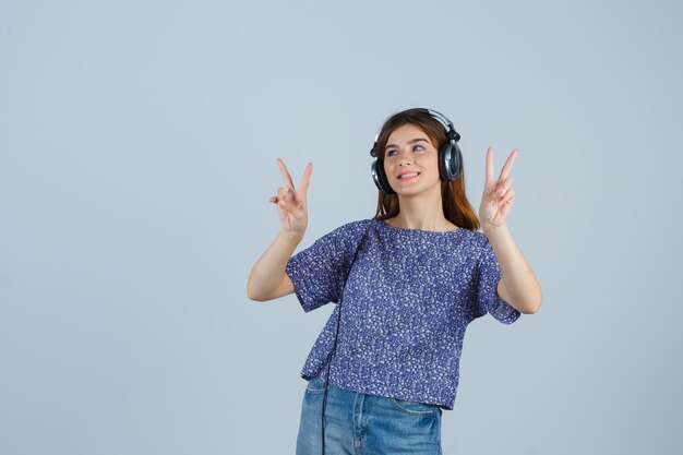 Expressive young woman posing in the studio