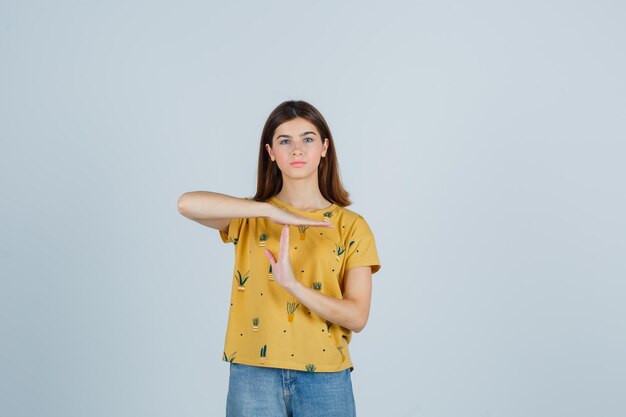 Expressive young woman posing in the studio