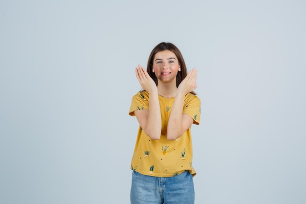 Expressive young woman posing in the studio