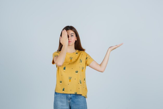 Expressive young woman posing in the studio