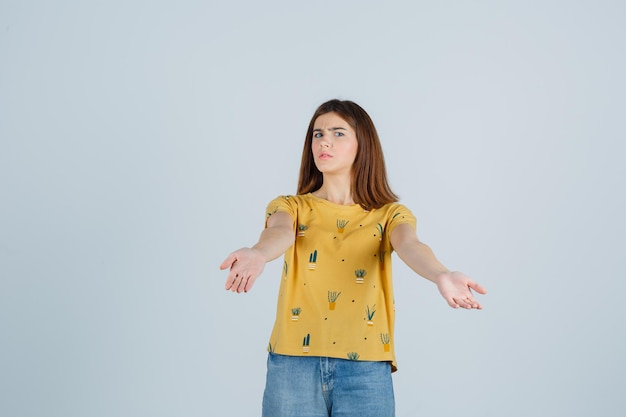 Expressive young woman posing in the studio