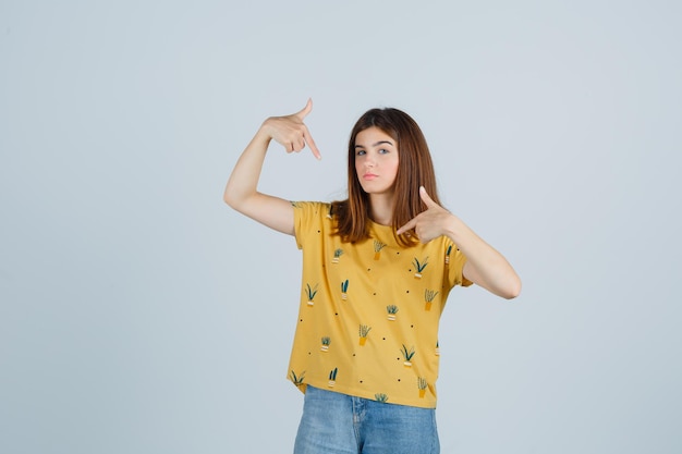 Expressive young woman posing in the studio