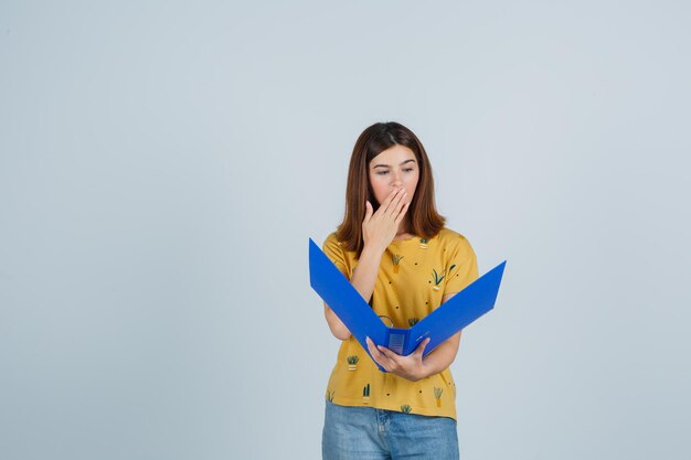 Expressive young woman posing in the studio