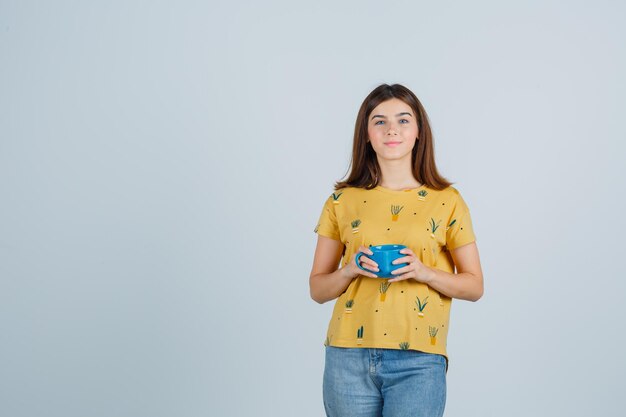 Expressive young woman posing in the studio