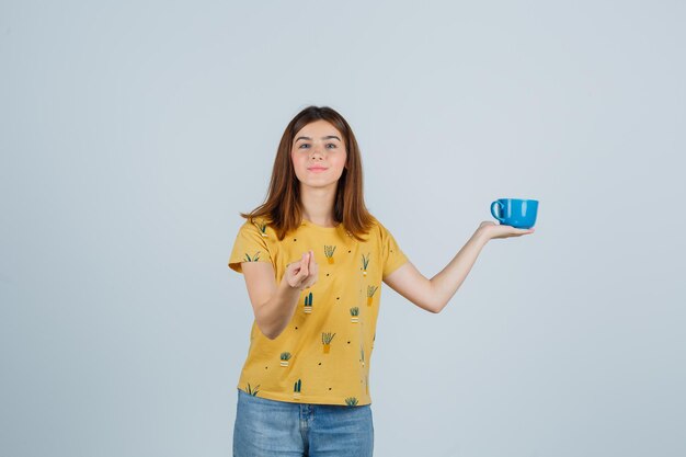 Expressive young woman posing in the studio