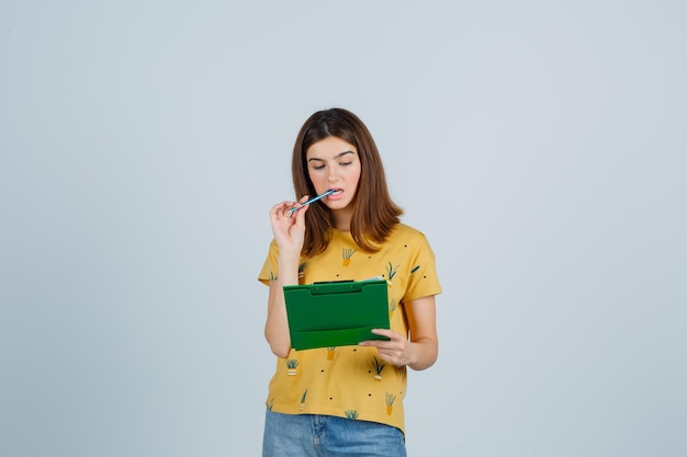 Expressive young woman posing in the studio