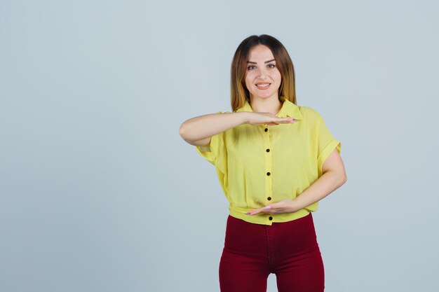 Expressive young woman posing in the studio