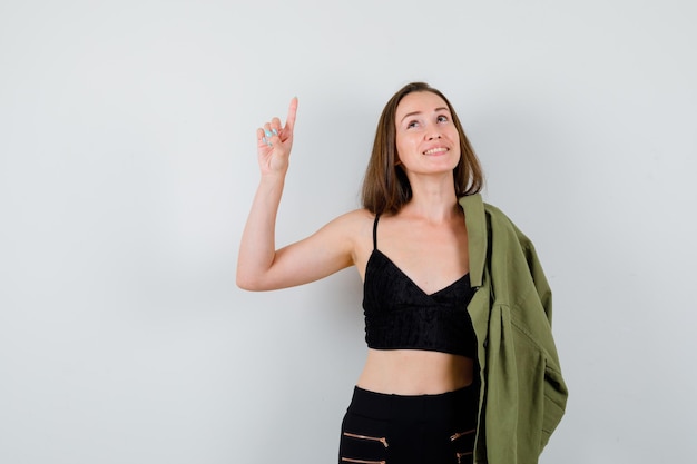 Expressive young woman posing in the studio