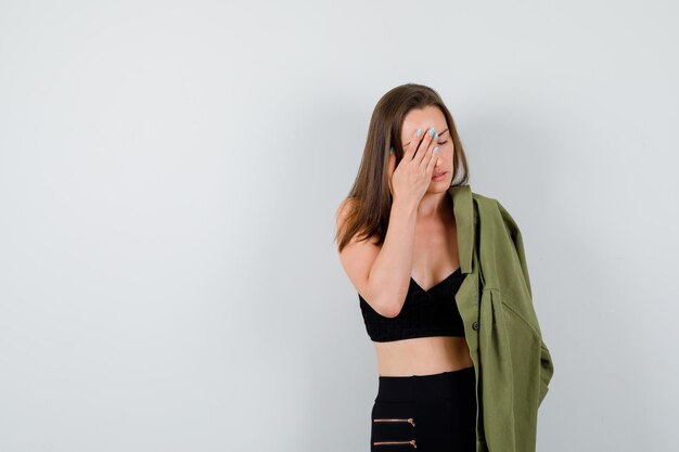 Expressive young woman posing in the studio