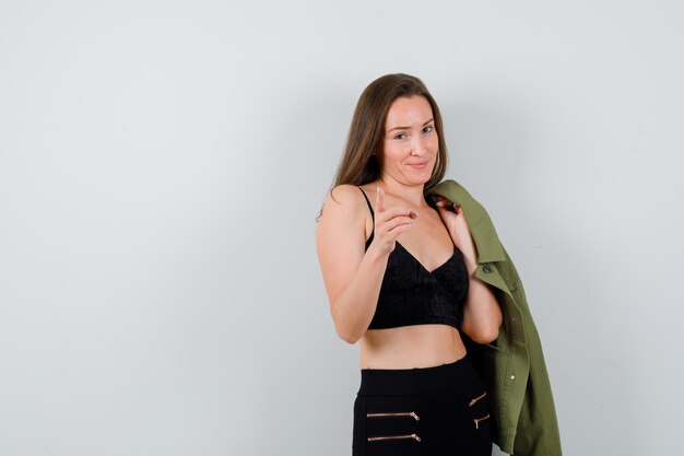 Expressive young woman posing in the studio