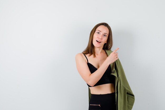 Expressive young woman posing in the studio