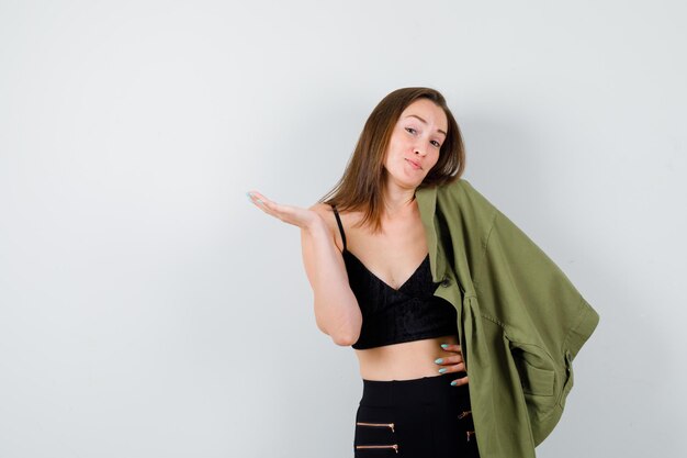 Expressive young woman posing in the studio