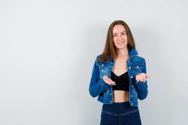 Expressive young woman posing in the studio