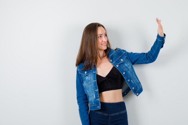 Expressive young woman posing in the studio