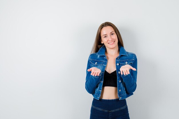 Expressive young woman posing in the studio