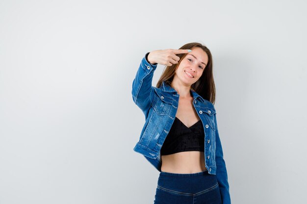 Expressive young woman posing in the studio