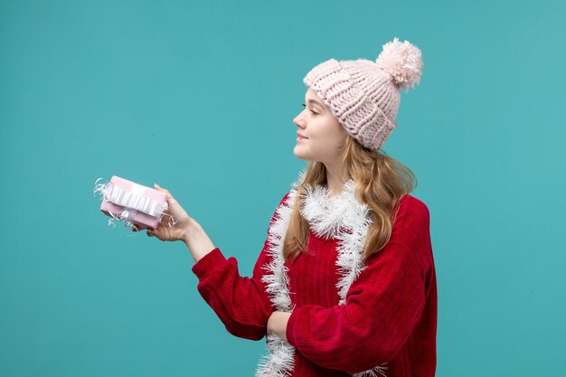 Expressive young woman posing for winter holidays