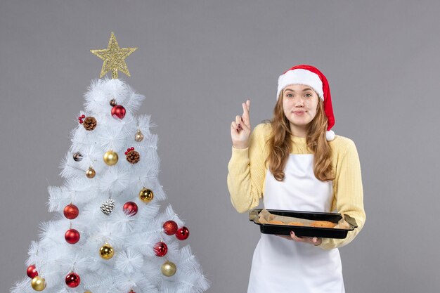 Expressive young woman posing for winter holidays