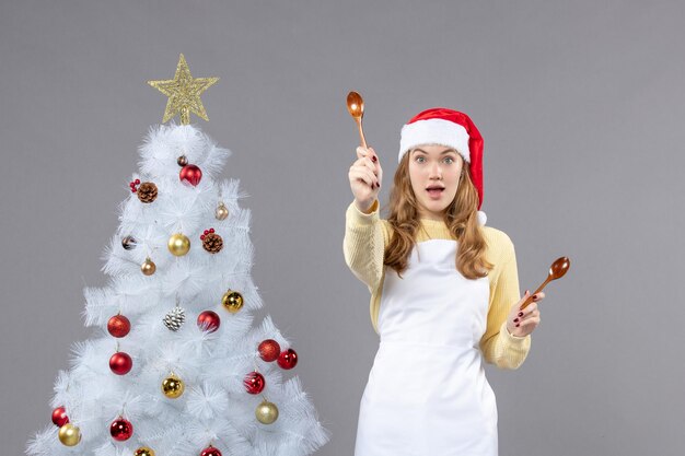 Expressive young woman posing for winter holidays