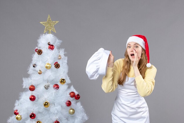 Expressive young woman posing for winter holidays