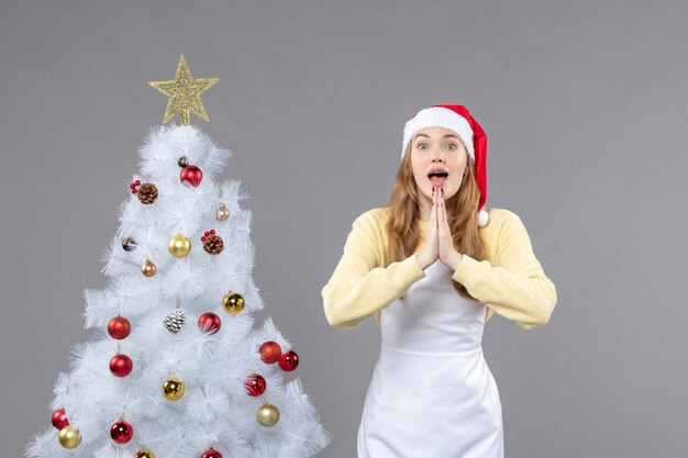 Expressive young woman posing for winter holidays