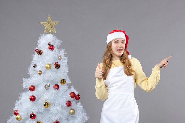 Expressive young woman posing for winter holidays