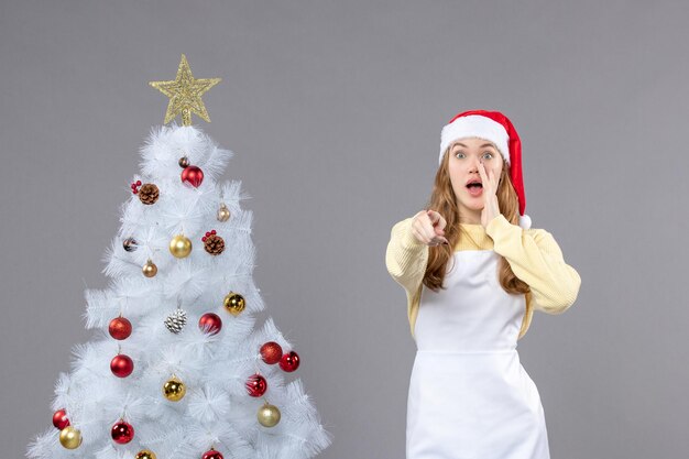 Expressive young woman posing for winter holidays