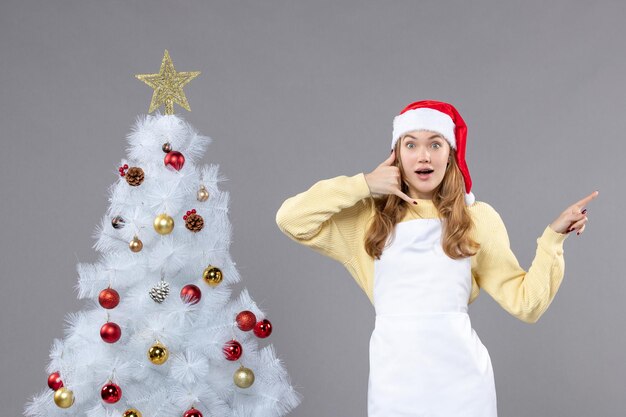 Expressive young woman posing for winter holidays