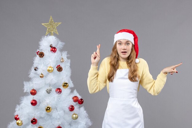 Expressive young woman posing for winter holidays