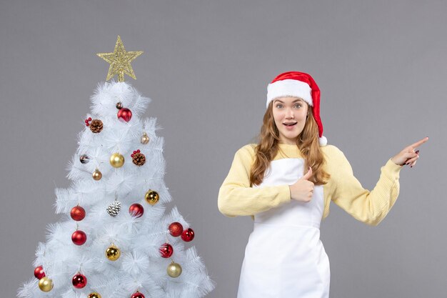 Expressive young woman posing for winter holidays