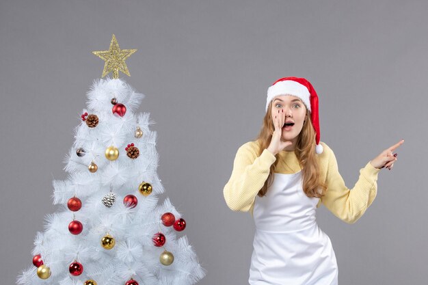 Expressive young woman posing for winter holidays