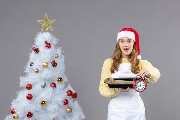 Expressive young woman posing for winter holidays