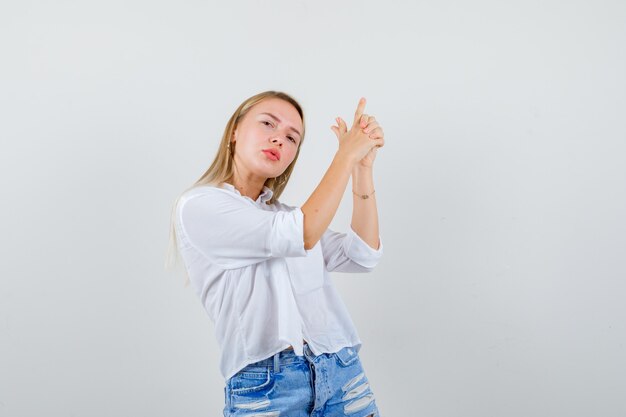 Expressive young woman posing