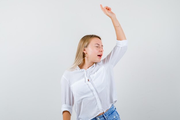 Expressive young woman posing