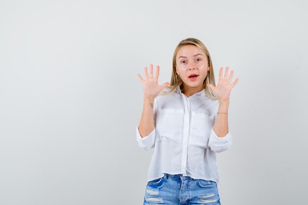 Expressive young woman posing