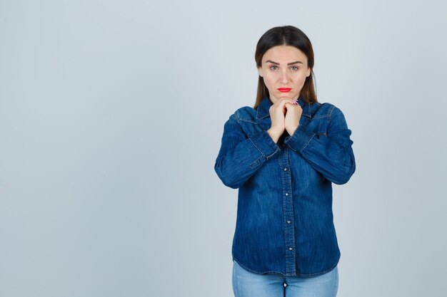 Expressive young woman posing