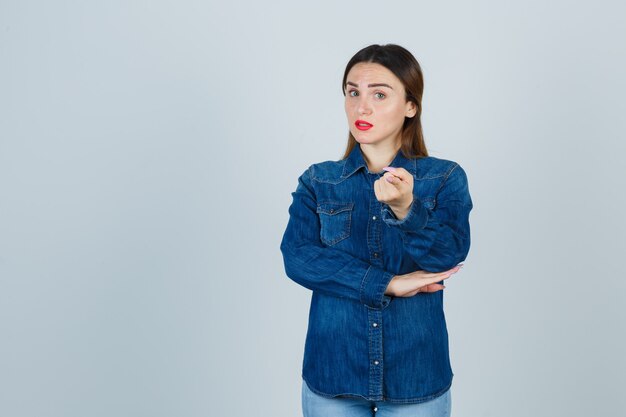 Expressive young woman posing