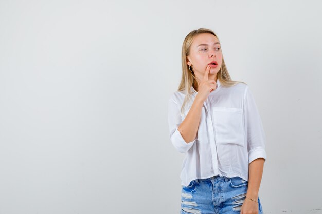 Expressive young woman posing