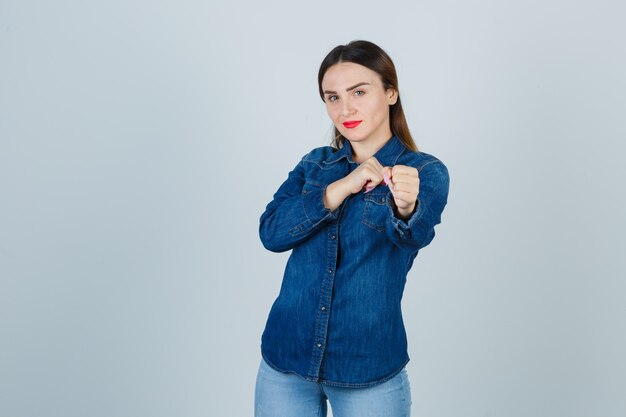 Expressive young woman posing