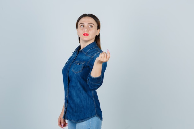 Expressive young woman posing