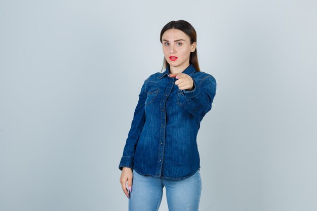 Expressive young woman posing