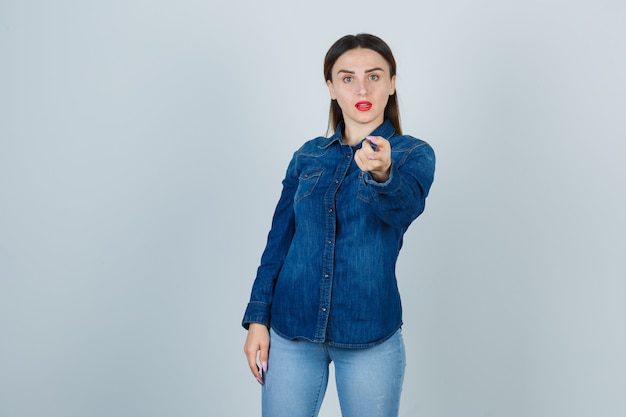 Expressive young woman posing