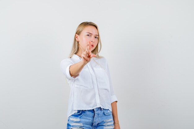 Expressive young woman posing