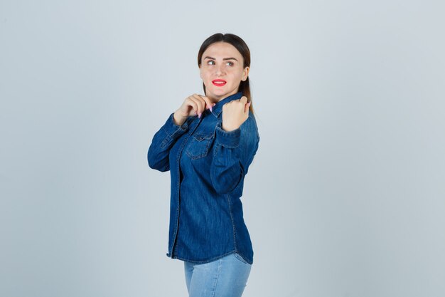 Expressive young woman posing