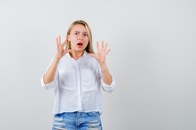 Expressive young woman posing