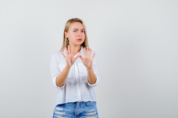 Expressive young woman posing