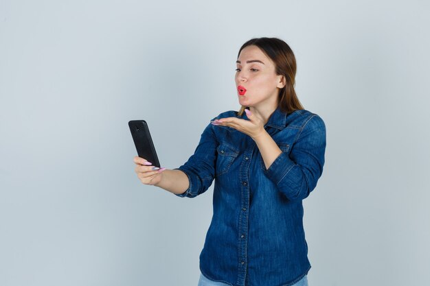 Expressive young woman posing