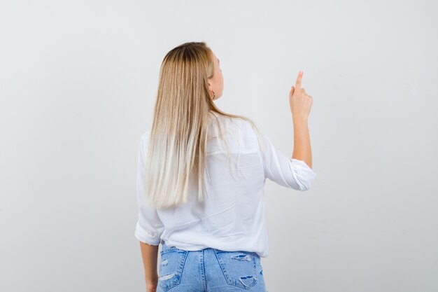 Expressive young woman posing